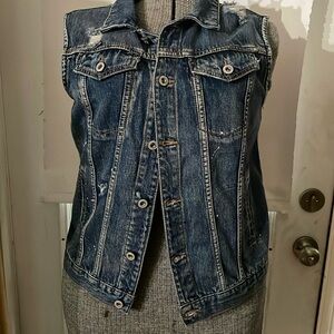 Upcycled embellished ladies jeans size L. Pit to put is 36”.